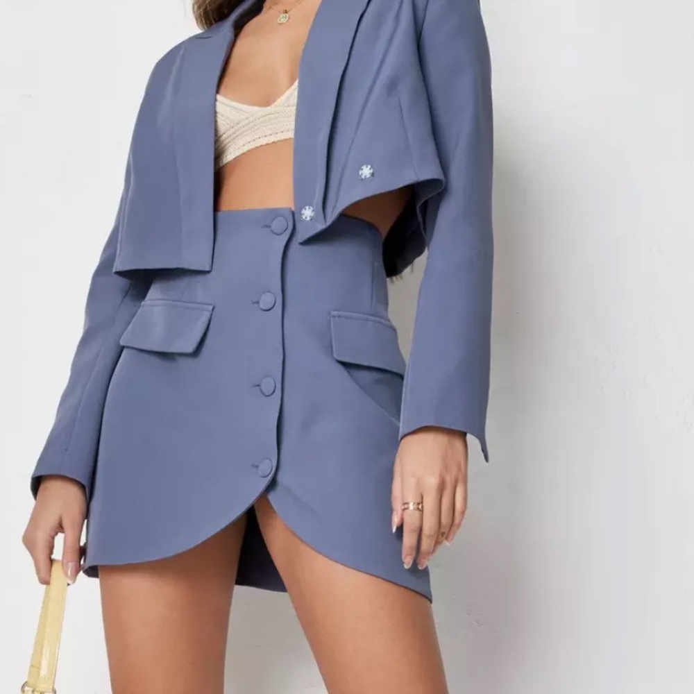 Blue tailored button front mini skirt